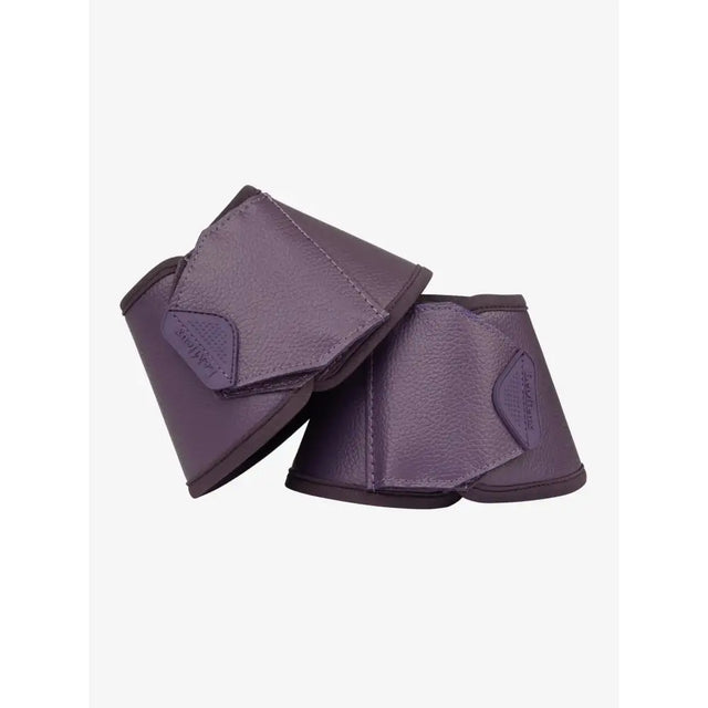 Purple leather lemieux arika reach boots juniper with black trim and velcro closure for horse over reach protection