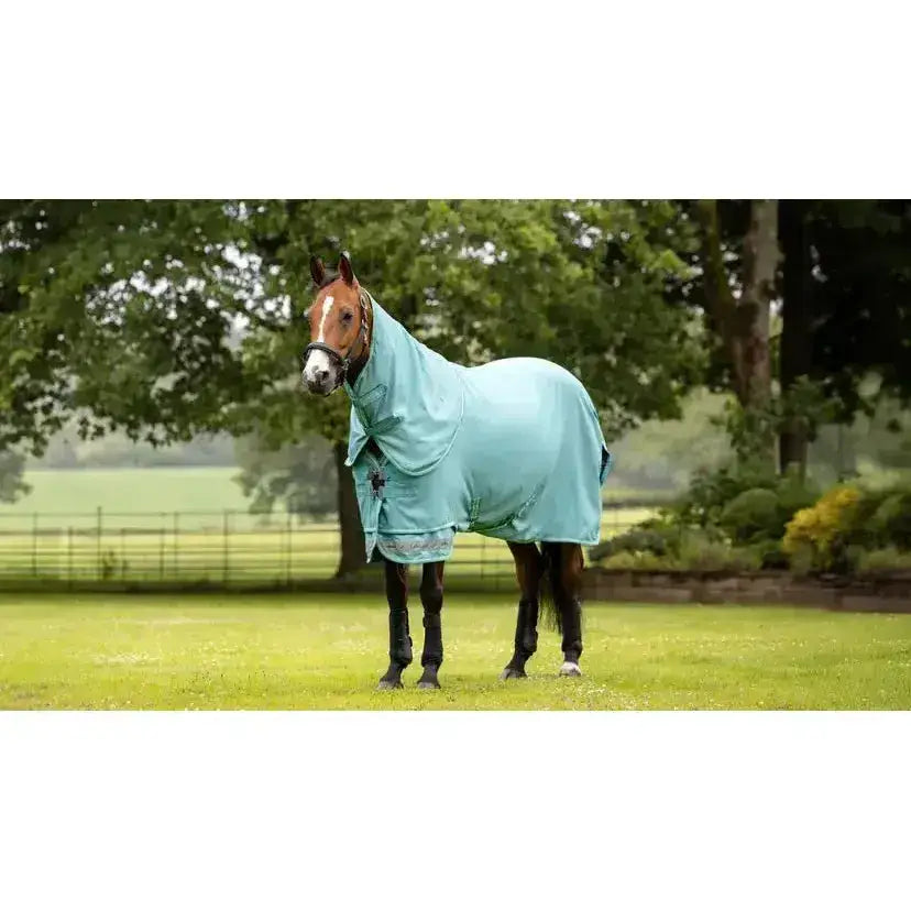 A light blue lemieux arika ripstop turnout rug lagoon with subtle pattern and anti-static shoulder lining for comfort