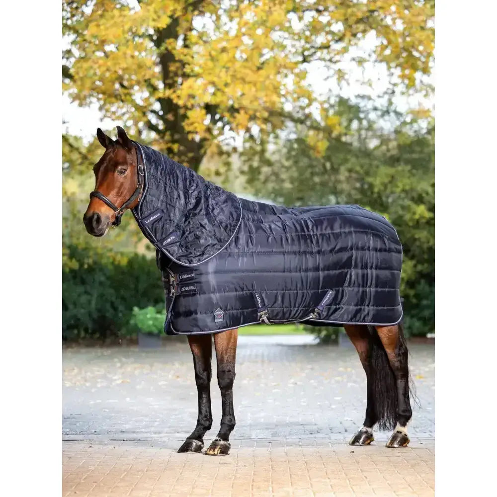 Dark navy quilted lemieux arika stable-tek 200g horse blanket with silver trim diamond ripstop outer and adjustable straps