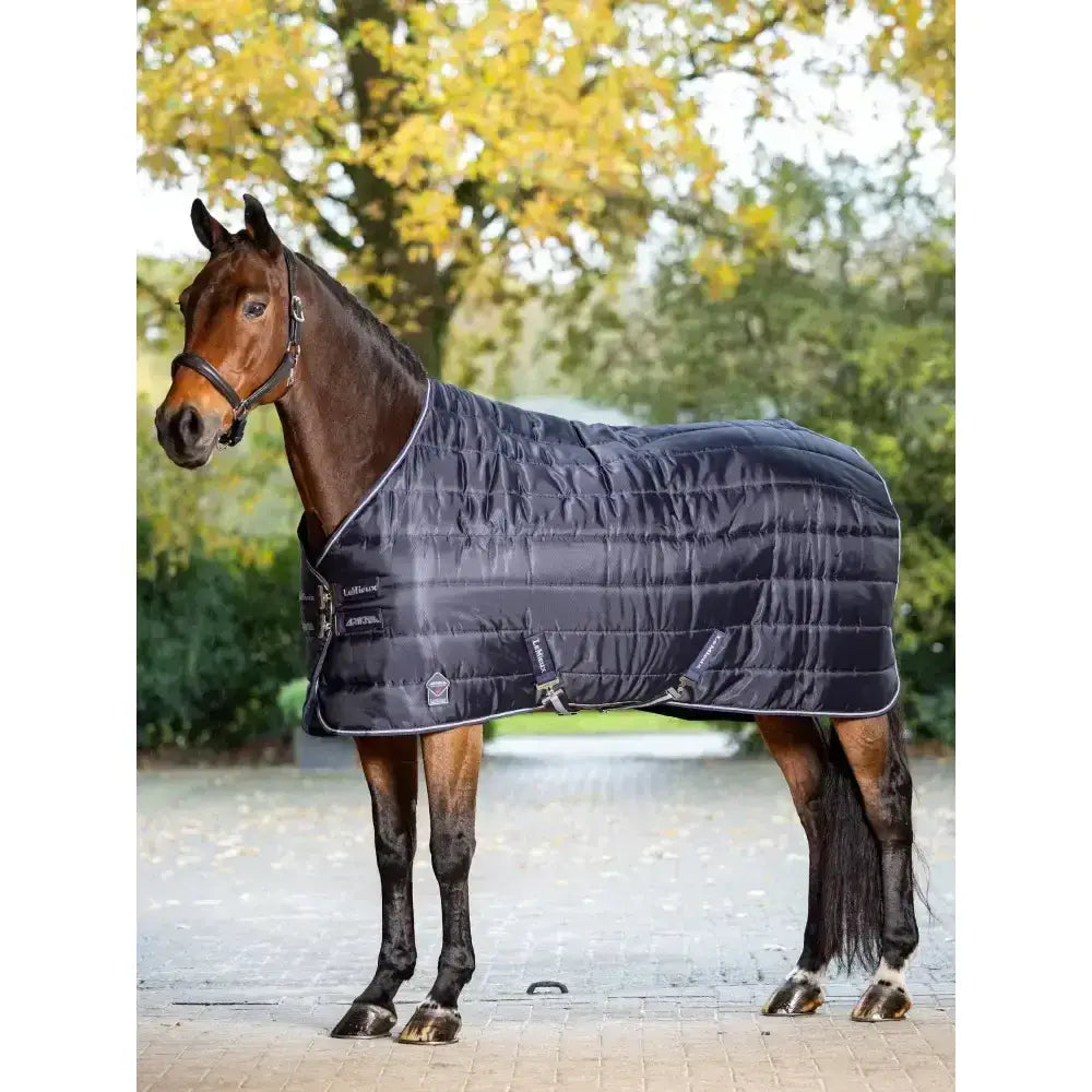 Dark blue lemieux arika stable-tek neck cover with silver trim diamond ripstop outer and adjustable straps