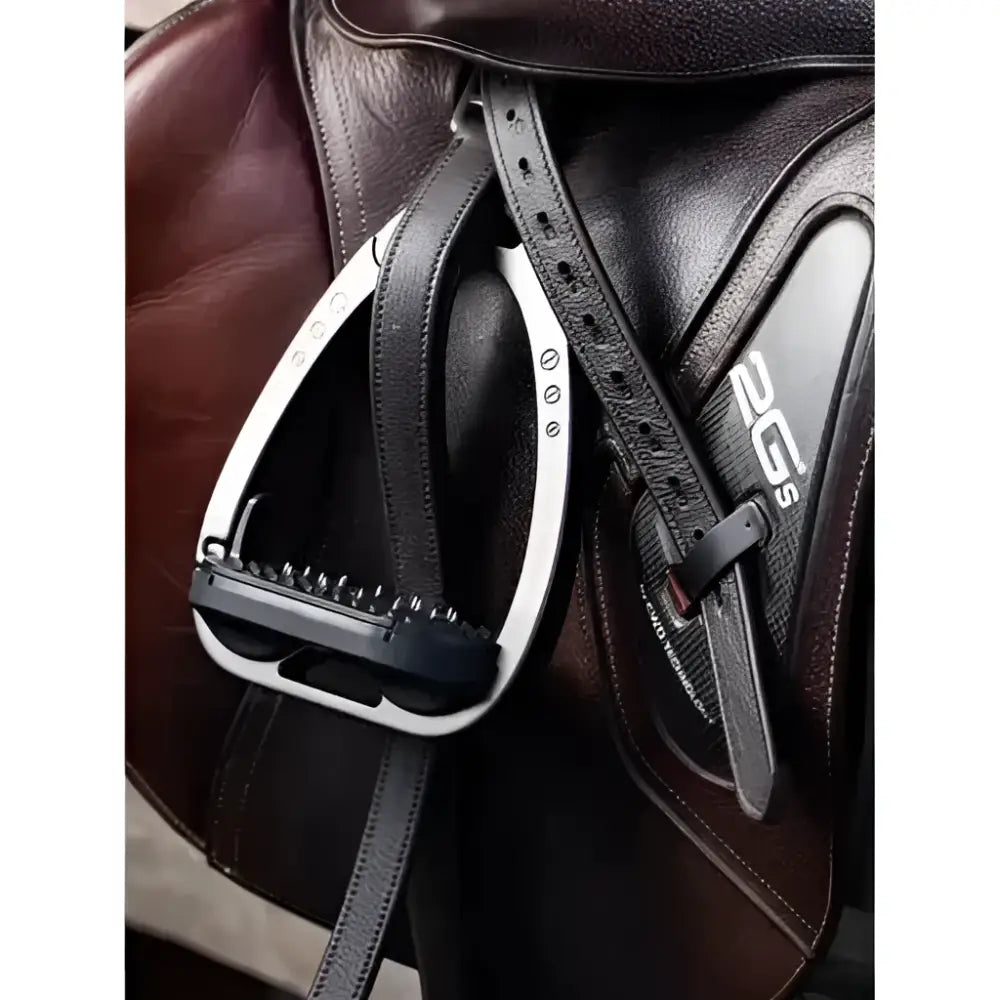 Black and silver lemieux arika stirrup with textured grip and dg logo paired with stirrup leather brown for sophisticated lemieux style