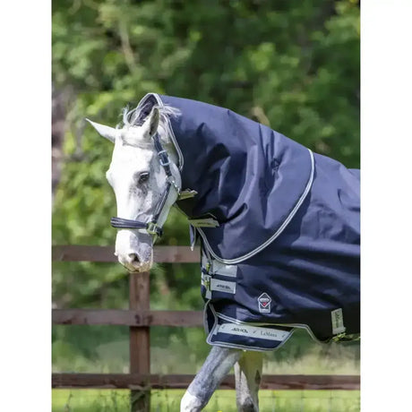 Navy blue lemieux arika storm-tek turnout horse blanket with white trim reflective stripes and brand logo patch