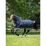 Navy blue lemieux arika storm-tek horse rug with white trim and reflective stripes featuring innovation gold award design