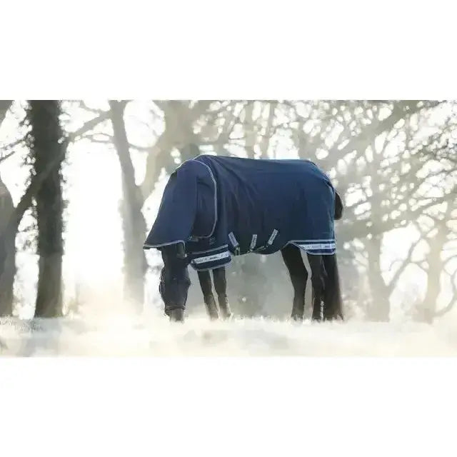 Navy blue lemieux arika storm-tek turnout blanket with white trim and reflective stripes 200g storm-tek rug innovation gold award