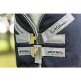 Navy blue lemieux arika storm-tek rug 50g with white straps and gold beta innovation gold buckles