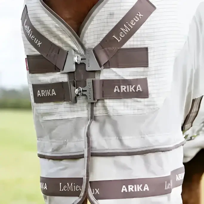 Gray and white lemieux arika sunstopper summer fly sheet with brown straps and silver buckles in stone color