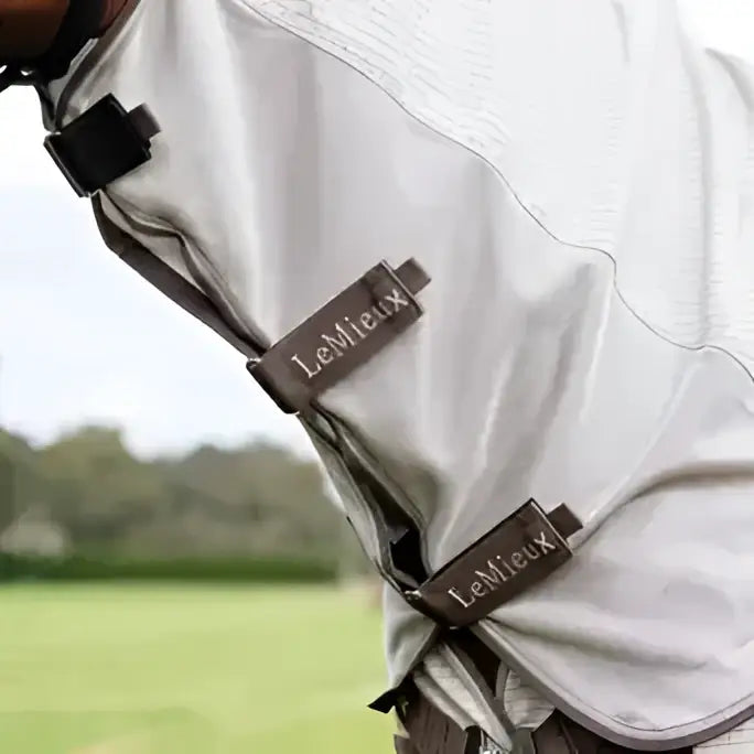 Light gray mesh lemieux arika sunstopper summer fly sheet with brown leather brand tags on straps stone color