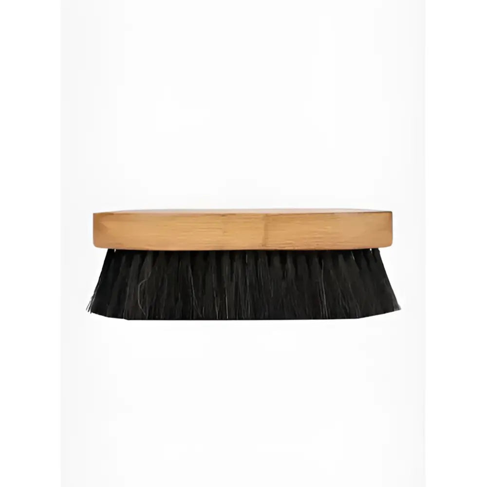 A sturdy lemieux artisan combi body brush with a light brown wooden handle and dense black bristles reliable everyday brush