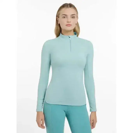 Light blue lemieux base layer aqua long-sleeve athletic top with quarter-zip collar for active wear