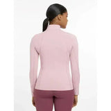 A soft pink long-sleeved fitted jacket with a high collar from lemieux base layer blossom collection