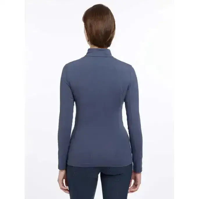 A sleek navy blue lemieux base layer dusk fitted long sleeve top with a high collar for cool weather layering