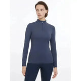 Lemieux base layer dusk blue navy long-sleeve athletic top with high collar and quarter-zip closure