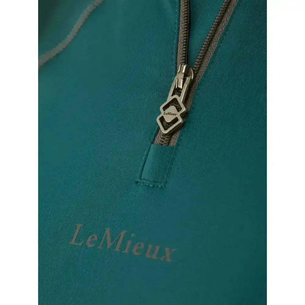 Teal lemieux base layer spruce with a metallic logo zipper pull designed for unrestricted comfort and style