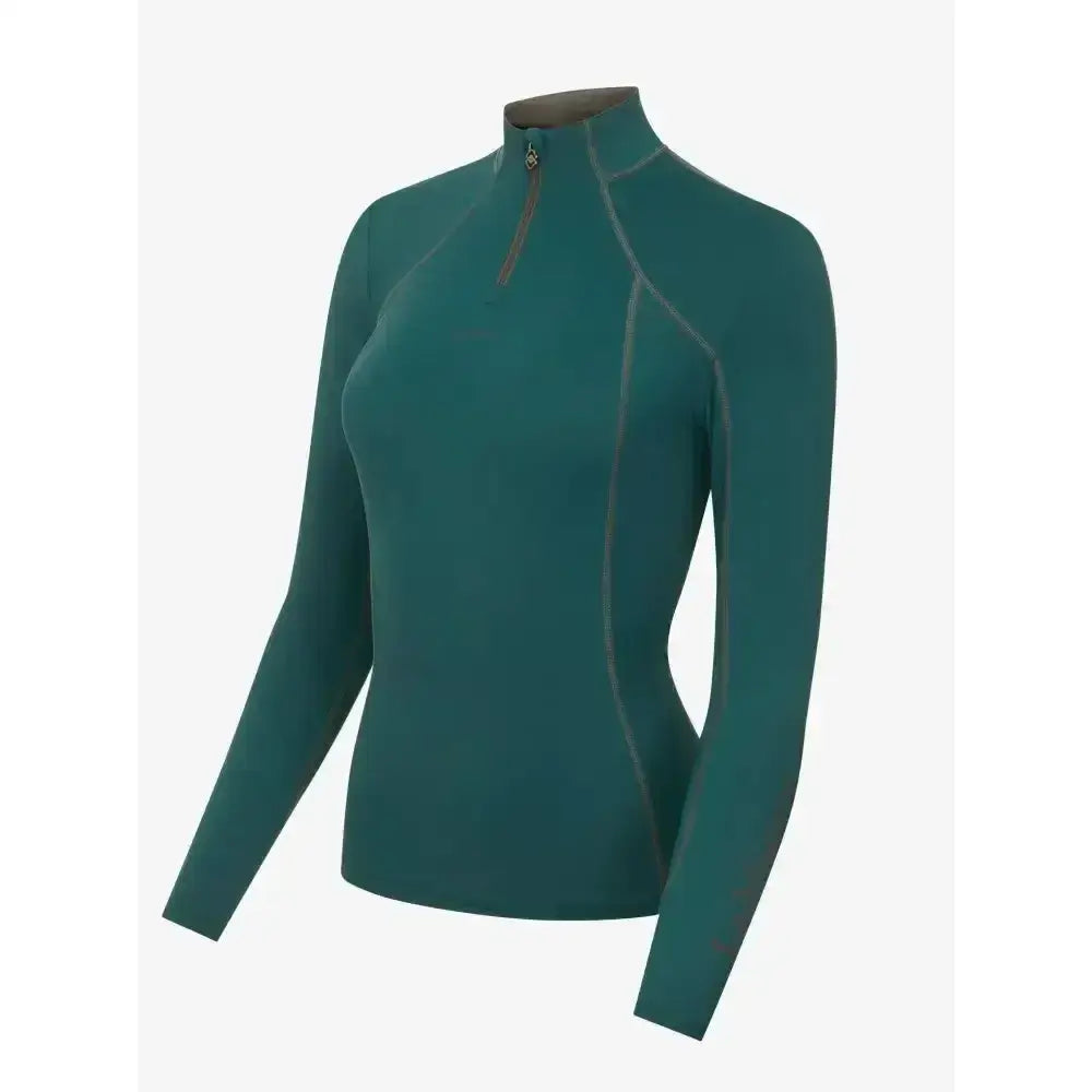 Teal long-sleeved lemieux base layer spruce with high collar and zipper detail for unrestricted comfort