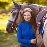 Blue long sleeved equestrian top with high collar and zipper front from lemieux base layers benetton matching heaven