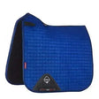 Blue quilted lemieux benetton blue prosport suede dressage saddle pad with black trim and diamond logo