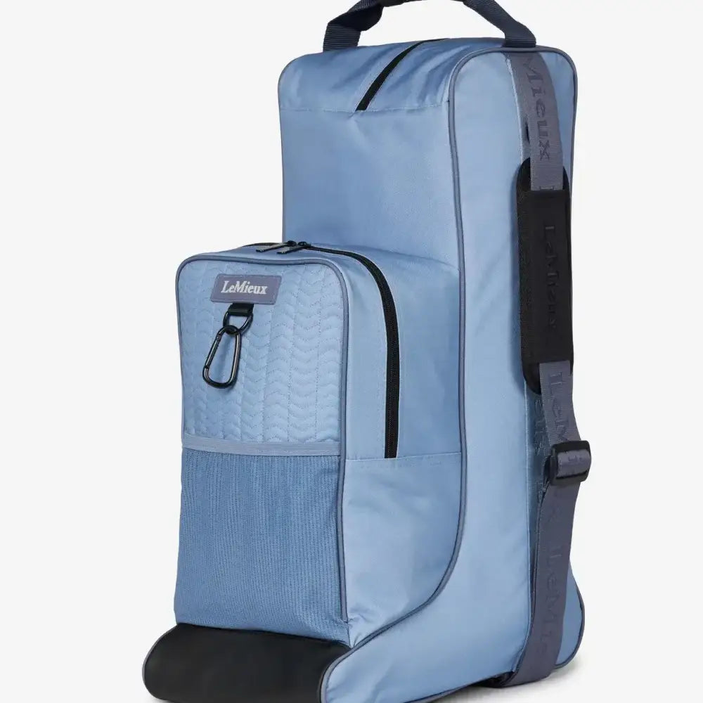 Light blue lemieux boot bag with black accents and mesh panel made of waterproof nylon for riding hat storage