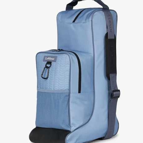 Light blue lemieux boot bag with black accents and mesh panel made of waterproof nylon for riding hat storage