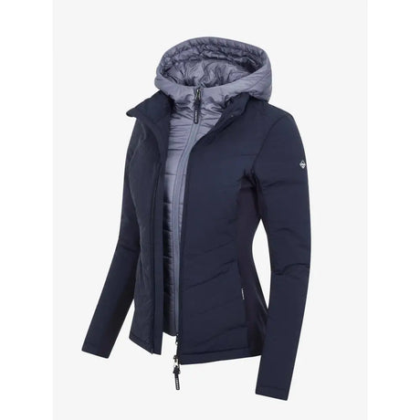 Dark navy lemieux brioney hybrid jacket with insulated hood, gray quilted interior, and subtle sleeve logo