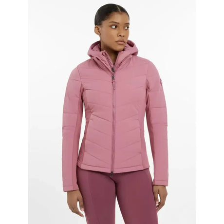 A soft pink lemieux brioney hybrid jacket with quilting, a hood, full zipper, and subtle stitching details