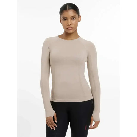 Beige lemieux britney seamless long sleeve top with round neckline and fitted seamless construction