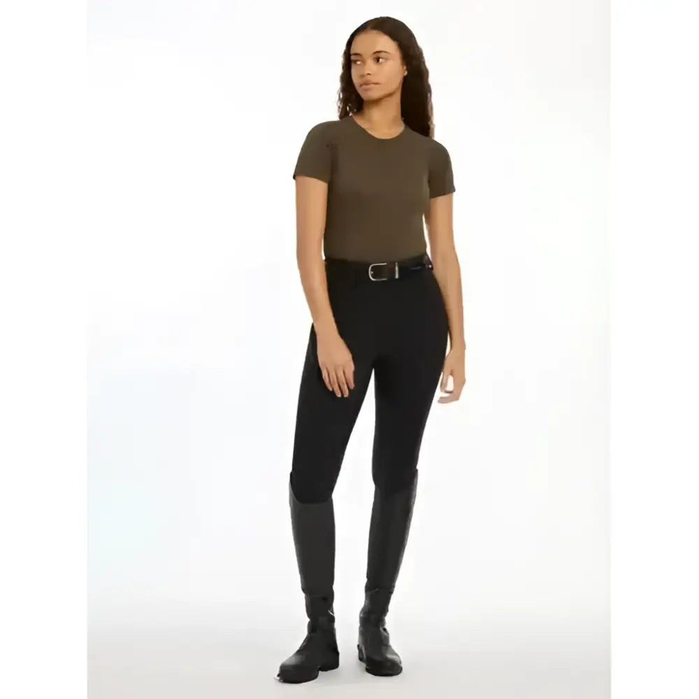 Black riding pants with smooth seamless short sleeve fit and subtle elastic waistband from lemieux britney seamless line