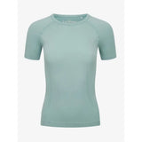 A soft mint green lemieux britney seamless short sleeve athletic top with raglan sleeves and round neckline