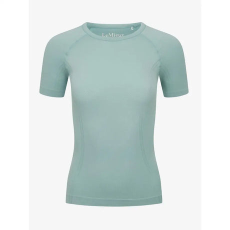 A soft mint green lemieux britney seamless short sleeve athletic top with raglan sleeves and round neckline