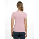 A soft pink lemieux britney seamless short sleeve top with a rounded neckline and subtle vertical seam detail