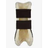 Cream-colored sheepskin lemieux capella comfort tendon boots with dark brown velour straps for cutting edge protection