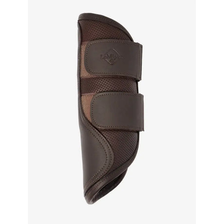 Brown lemieux capella leather brushing boots with perforated sections and adjustable velcro straps for comfort