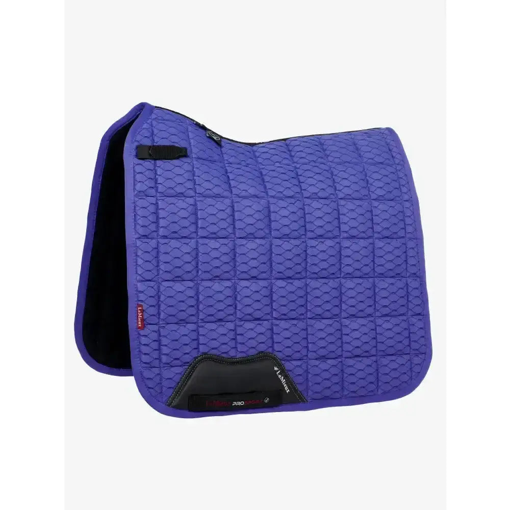 Purple quilted lemieux carbon mesh dressage saddle pad with black trim and branded label for classic lemieux dressage