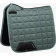 A quilted sage green lemieux carbon mesh dressage square with black trim and reinforced corners