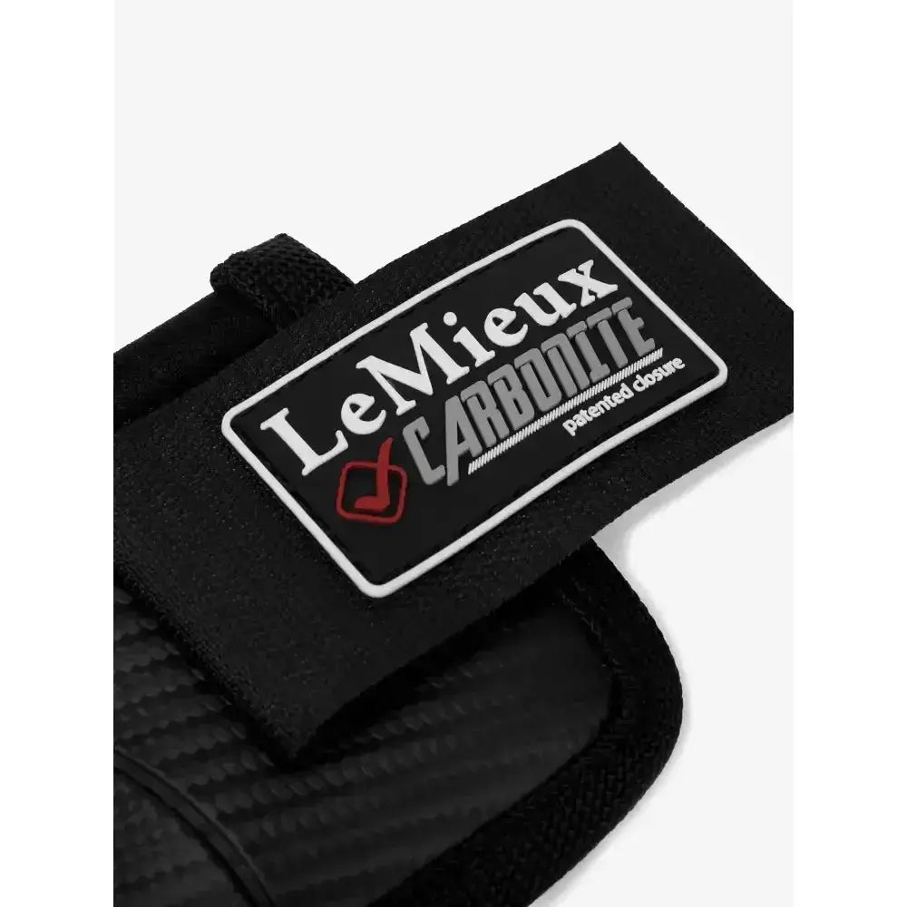 Black lemieux carbonite over reach boots wrist wrap with strong ballistic outer and white red logo patch