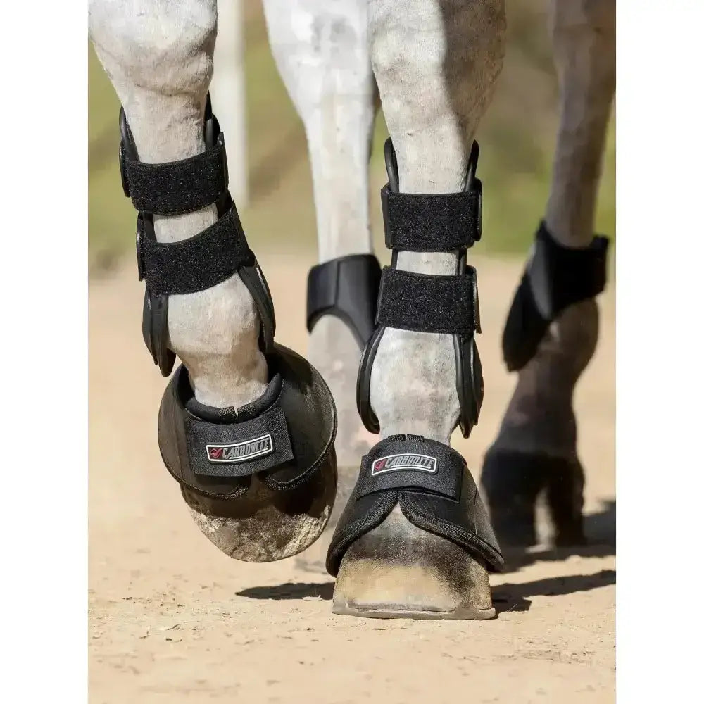 Black lemieux carbonite over-reach boots with adjustable velcro straps and strong ballistic outer glossy finish
