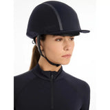 Equestrian riding helmet worn with Lemieux Carmine Hat Silk Navy for stylish safety