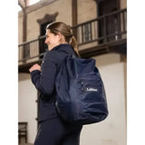 Navy blue lemieux carry all backpack with front pocket and subtle logo perfect for equestrian use