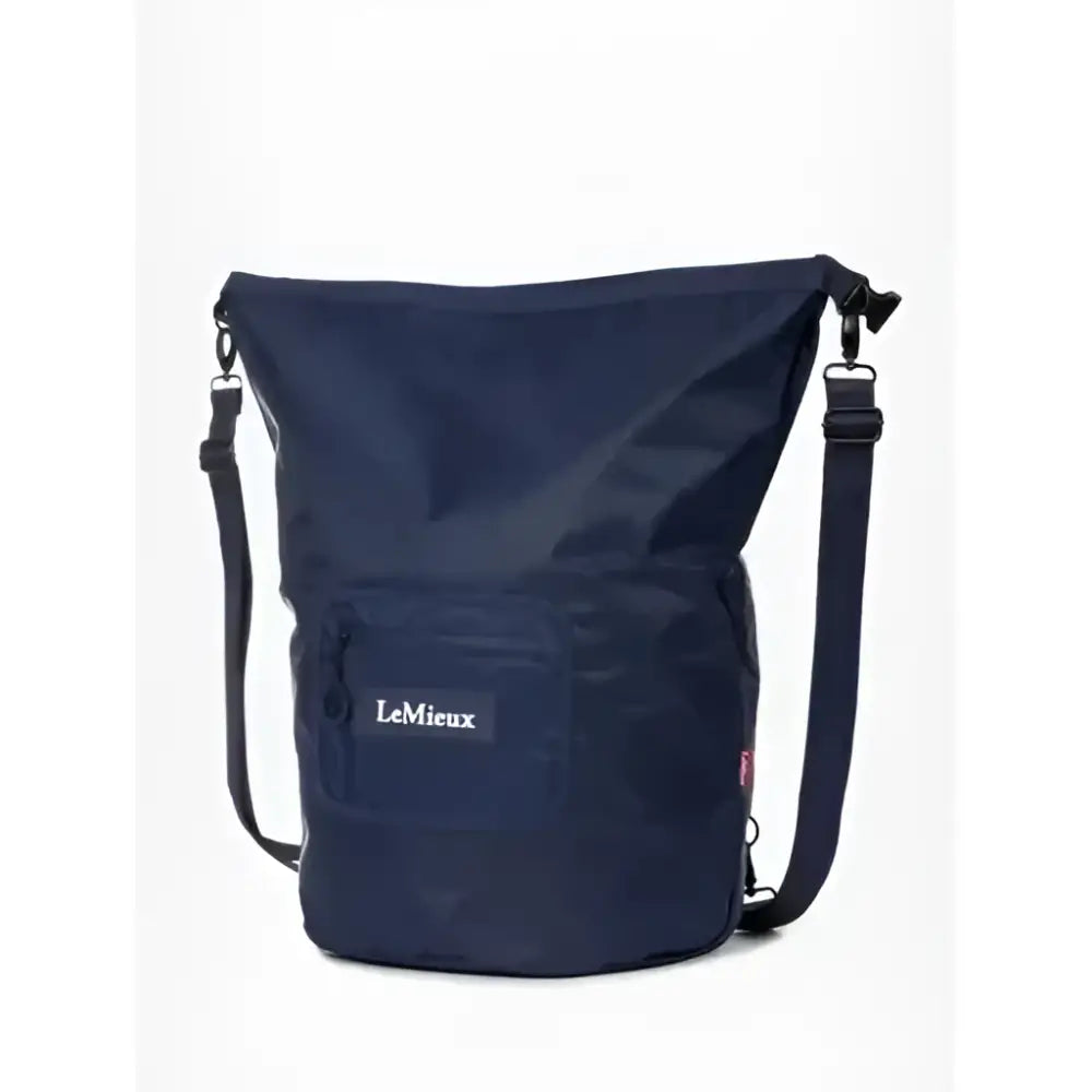 Navy blue lemieux carry waterproof backpack navy with black straps and front pocket for equestrian use