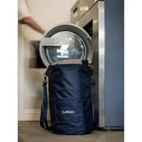 Dark blue durable fabric lemieux carry laundry bag with shoulder strap and logo perfect for equestrian use backpack navy