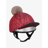 Red lemieux casey hat silk ember with repeating monogram, beige faux fur pom pom, and silver metallic band