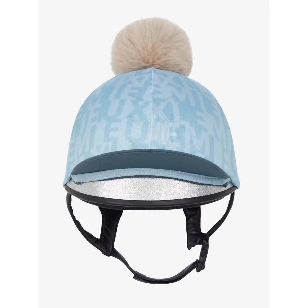 Light blue Lemieux Casey Hat Silk Glacier with beige pom-pom on top