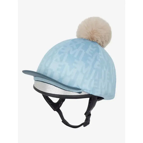 Light blue velvet lemieux casey hat silk glacier with subtle pattern and beige pom-pom on top