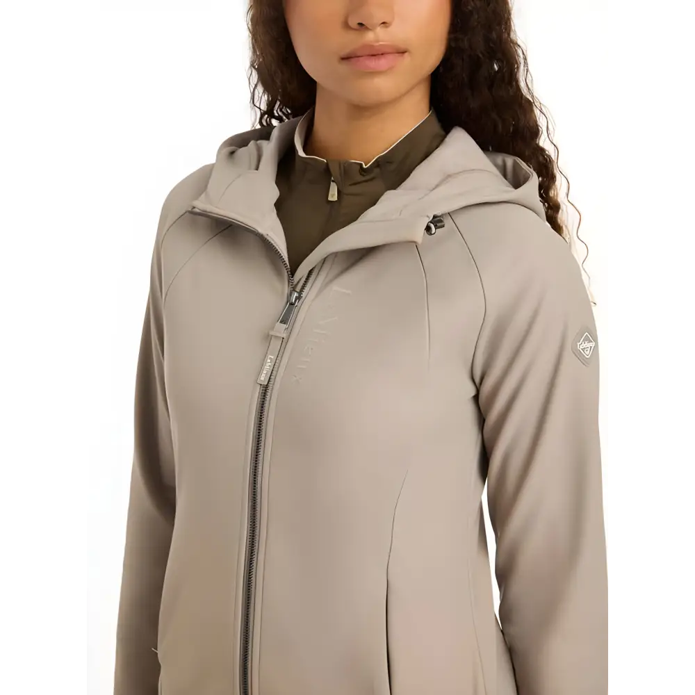 Beige Lemieux Charlotte Soft Shell Jacket Ash worn by a person with curly hair