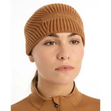 A tan ribbed knit lemieux clara cable headband with a subtle embroidered logo in ginger color