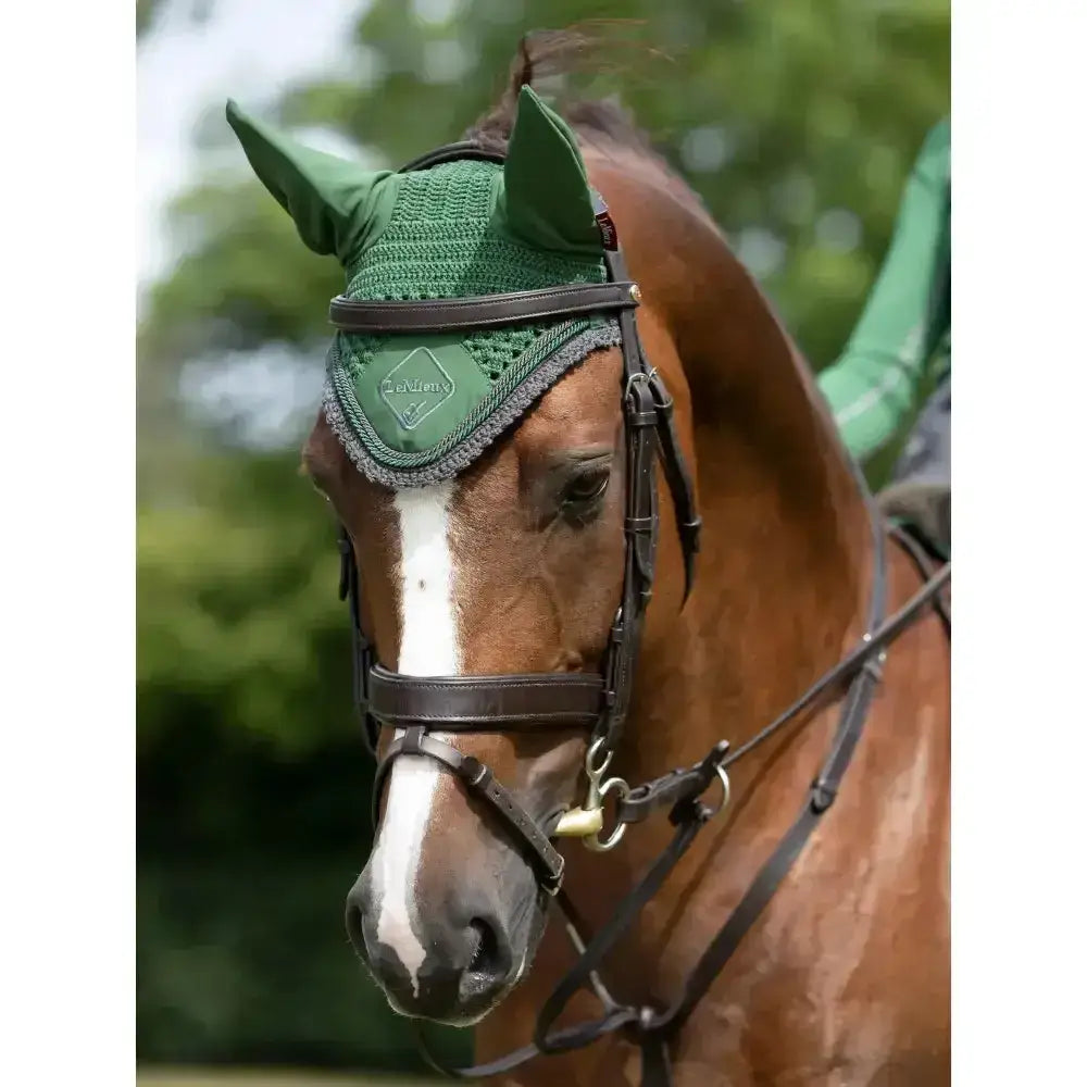 Green crocheted lemieux classic fly hood with black leather trim and diamond logo for fly hoods hunter use