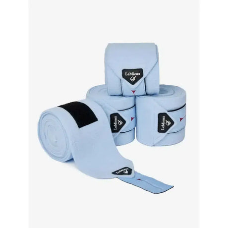 Light blue lemieux classic polo bandages mist rolls with black elastic bands and luxury lemieux fleece tags