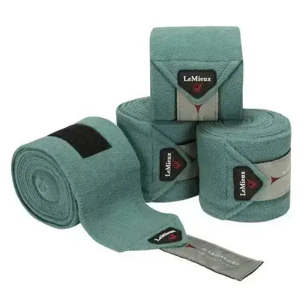 Teal plush lemieux classic polo bandages with black and gray branded labels in sage luxury polo style