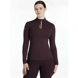 A maroon lemieux classique base long-sleeved damson layer with high collar zipper and subtle chest branding