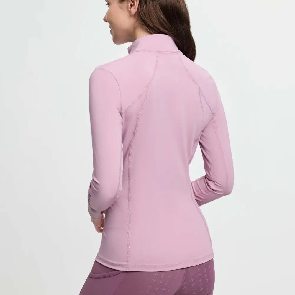 A soft lavender lemieux classique base layer fondant athletic jacket with high collar and seamless design