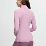 A soft lavender lemieux classique base layer fondant athletic jacket with high collar and seamless design